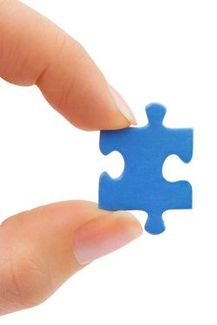 Holding puzzle piece - left side